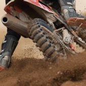 Rider driving in the motocross race the rear wheel motocross bike